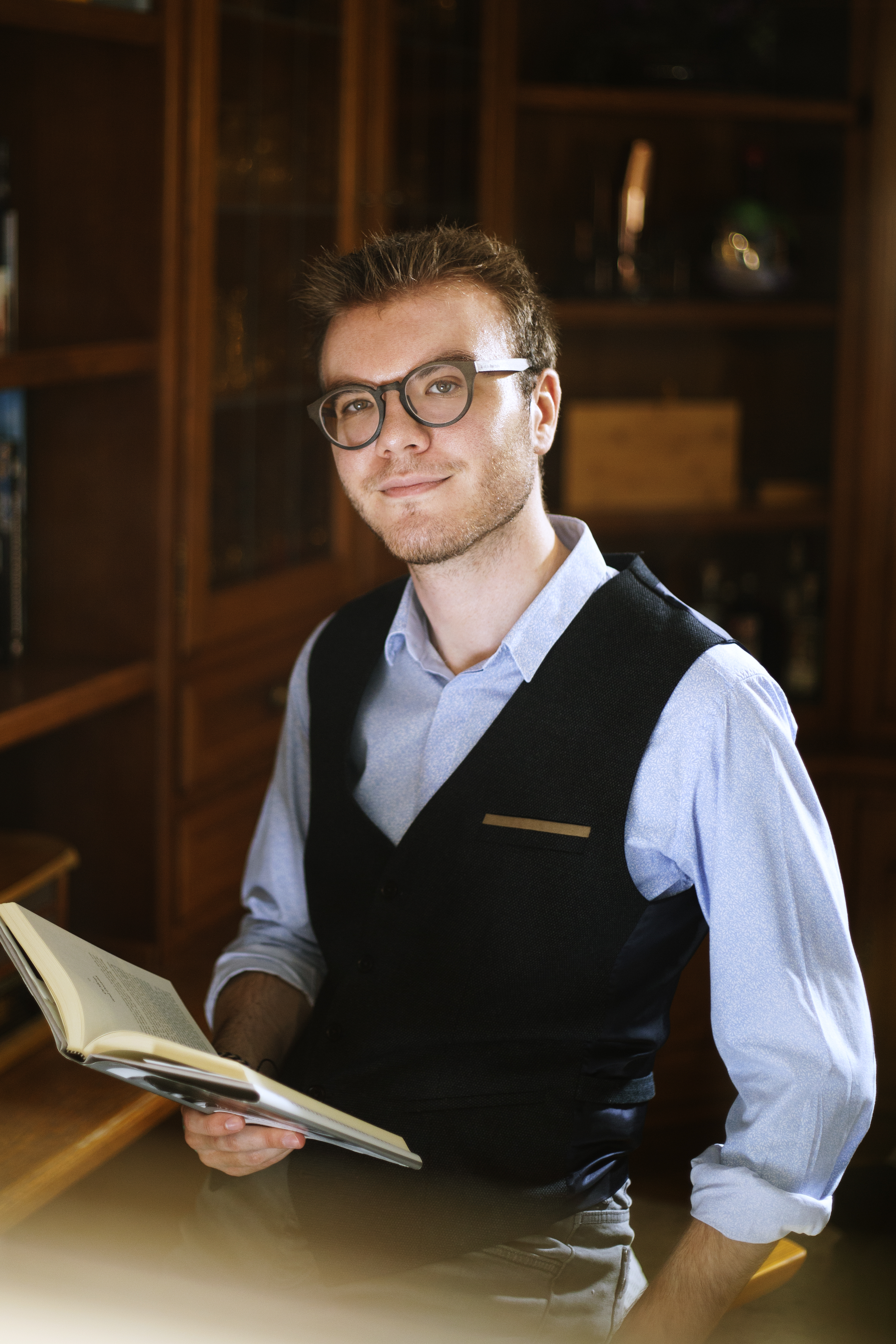 a man holding a book